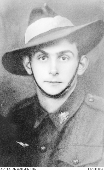 A studio portrait of NX152875 Private (Pte) Neville Angus Shepherd, 47 Battalion, of Batemans Bay, NSW. A factory hand prior to enlistment, Pte Shepherd died of wounds in Bougainville on 3 May 1945, aged 22.