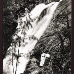 A photograph of Spring Creek Falls, Araluen with a group of 5 ladies and 1 gentleman at various levels beside the falls.